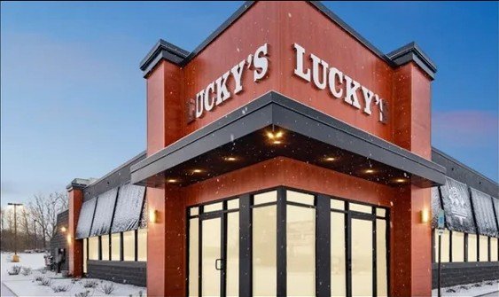 Project Gallery Lucky's restaurant storefront with brick and metal panel brand facade
