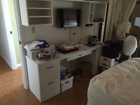 Project Gallery Built-in white office desk with overhead cabinetry and storage drawers
