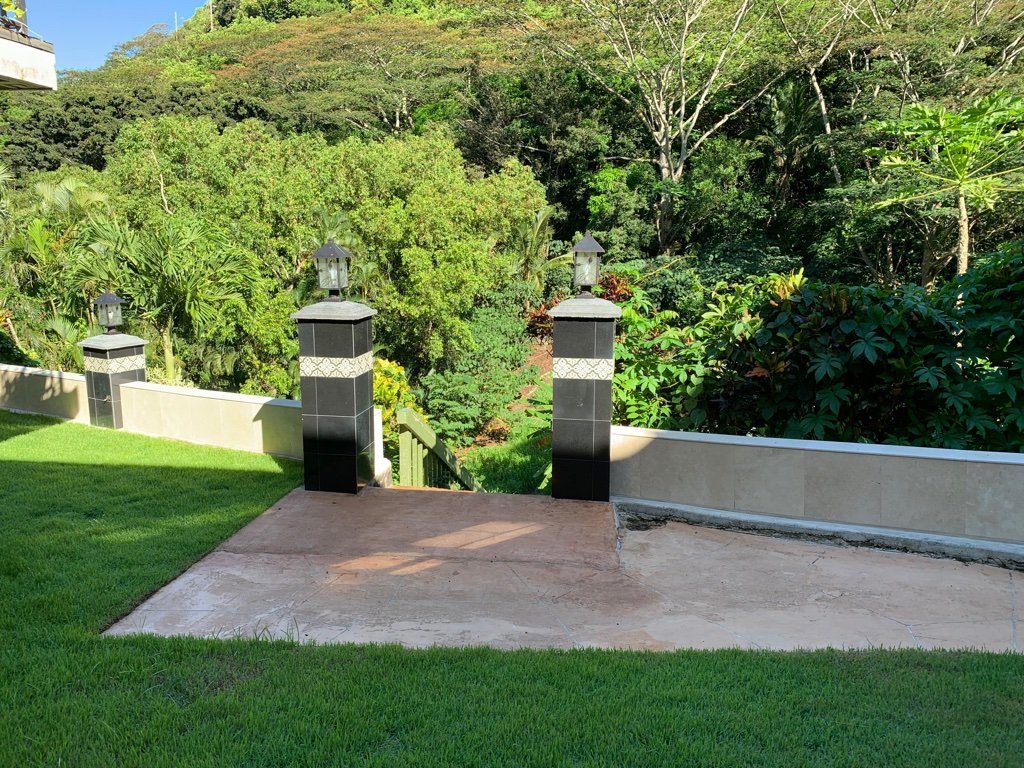 Project Gallery Granite lantern piers and travertine patio installation