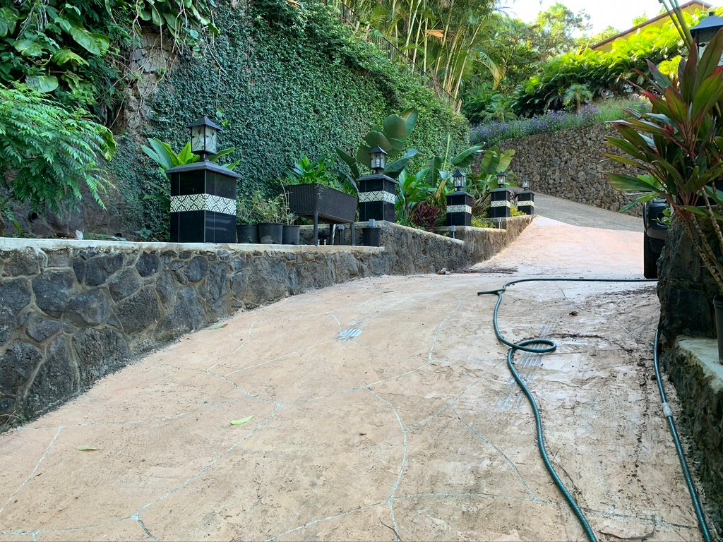 Project Gallery Stacked stone retaining wall with paired granite lantern piers