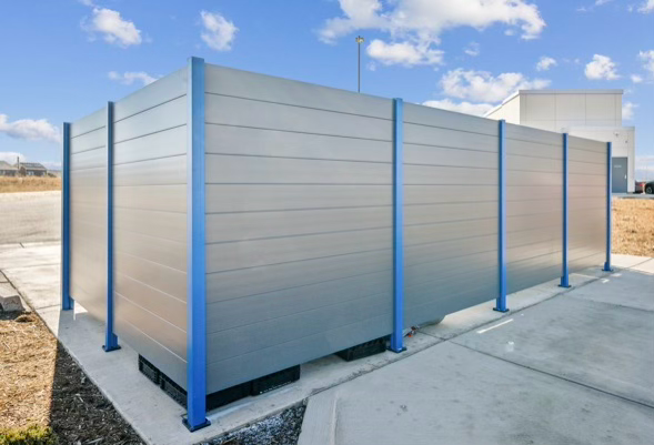 Project Gallery Powder-coated aluminum panel enclosure screening mechanical equipment on a commercial site