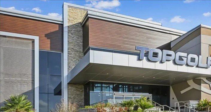 Project Gallery Topgolf entertainment venue exterior with mixed metal and stone panel cladding